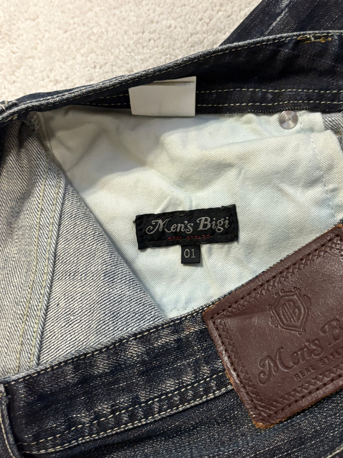 Japanese brand navy whiskered straight leg streaked denim jeans