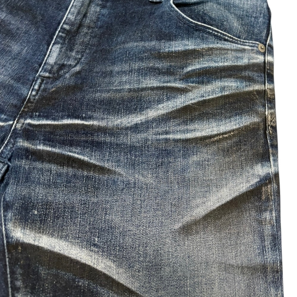 Semantic Design streaked claw mark wash denim jeans