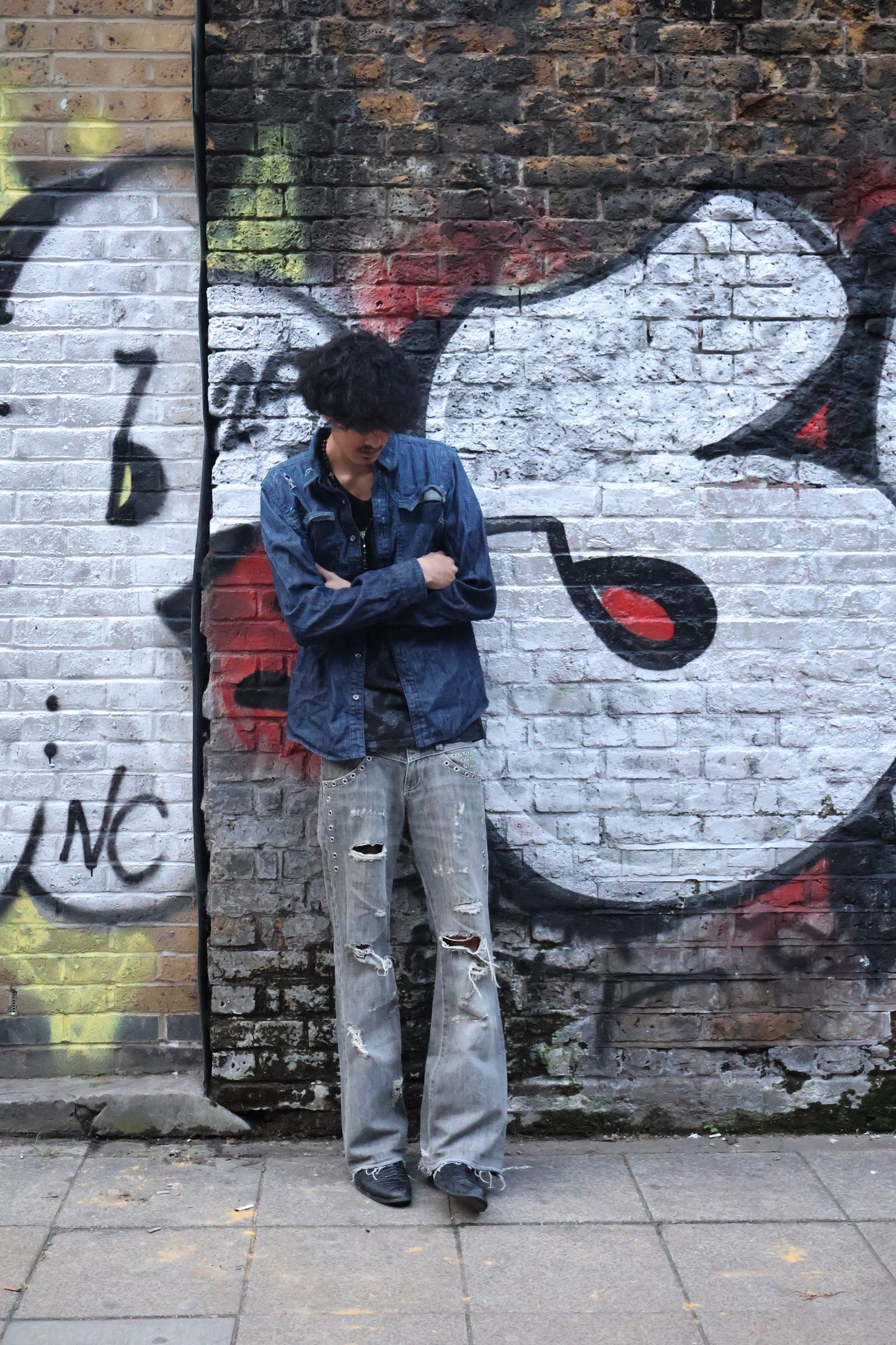 Tornado Mart distressed eyelet hole flare denim jeans
