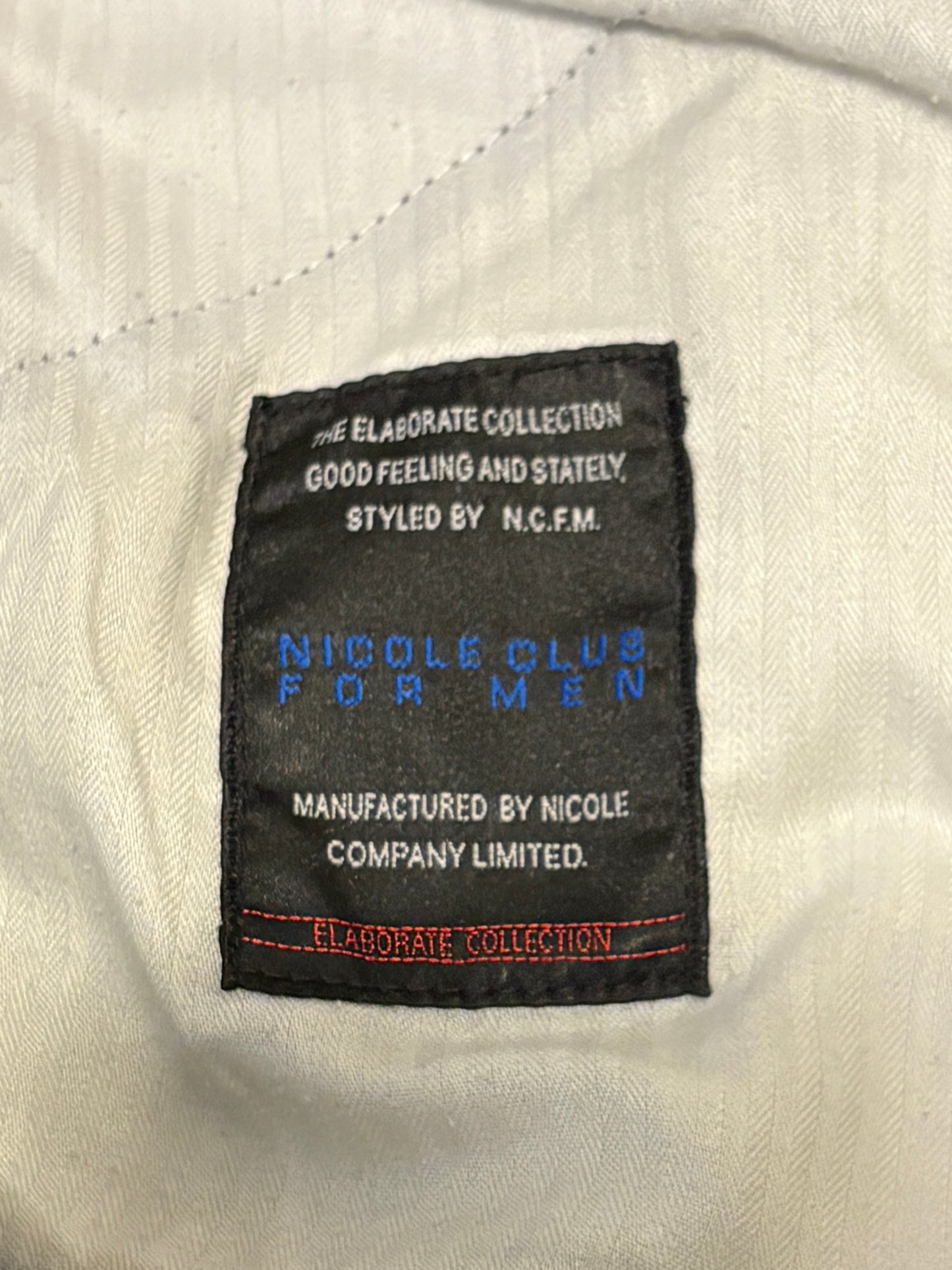 Nicole Club distressed patchwork claw mark bootcut denim jeans