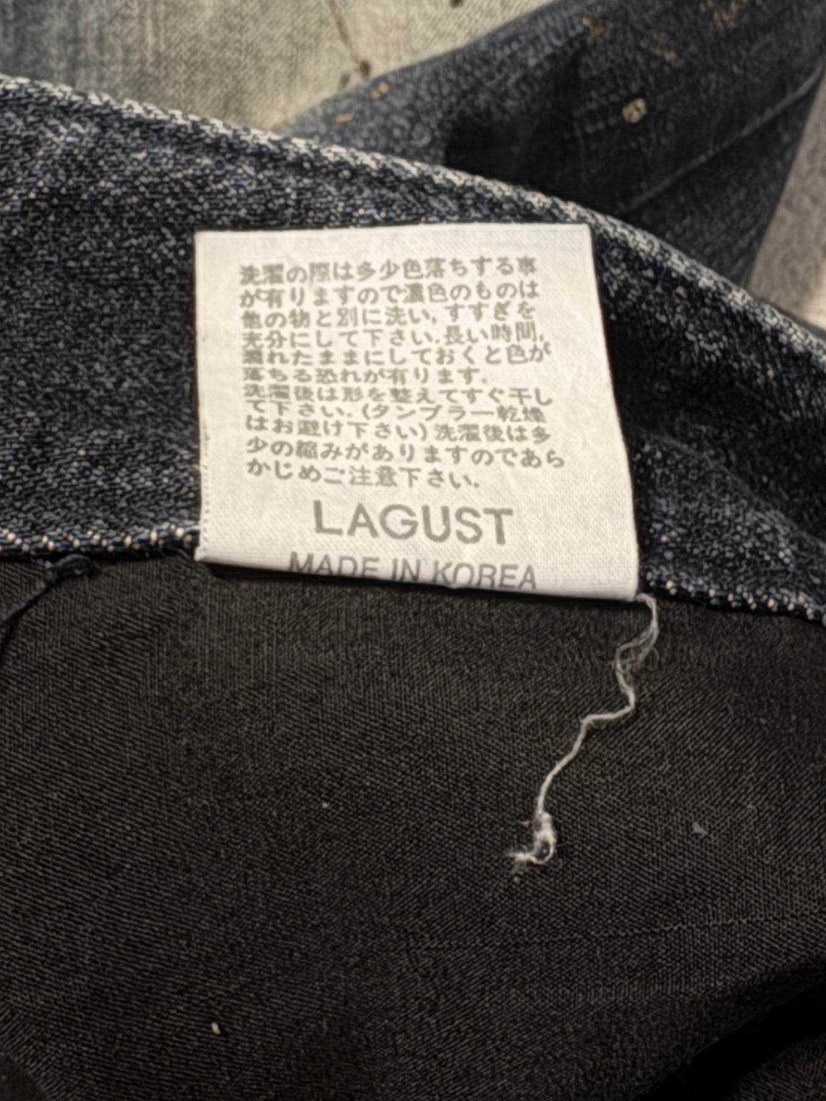 Lagust blue distressed painted bootcut jeans