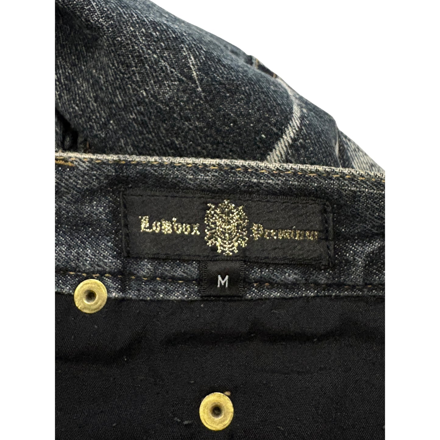 Lowbox streaked painted navy bootcut denim jeans