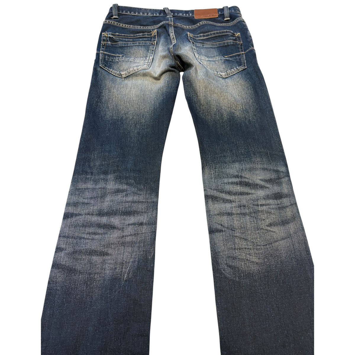 Tornado Mart blue streaked gradient wash distressed denim jeans