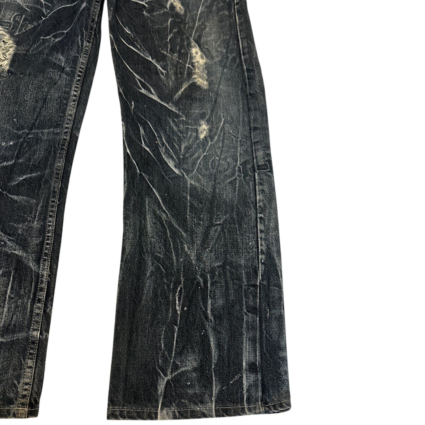 Nylaus distressed streaked wash denim jeans