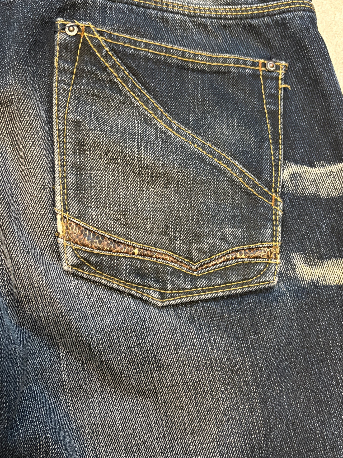 Nicole Club distressed patchwork claw mark bootcut denim jeans