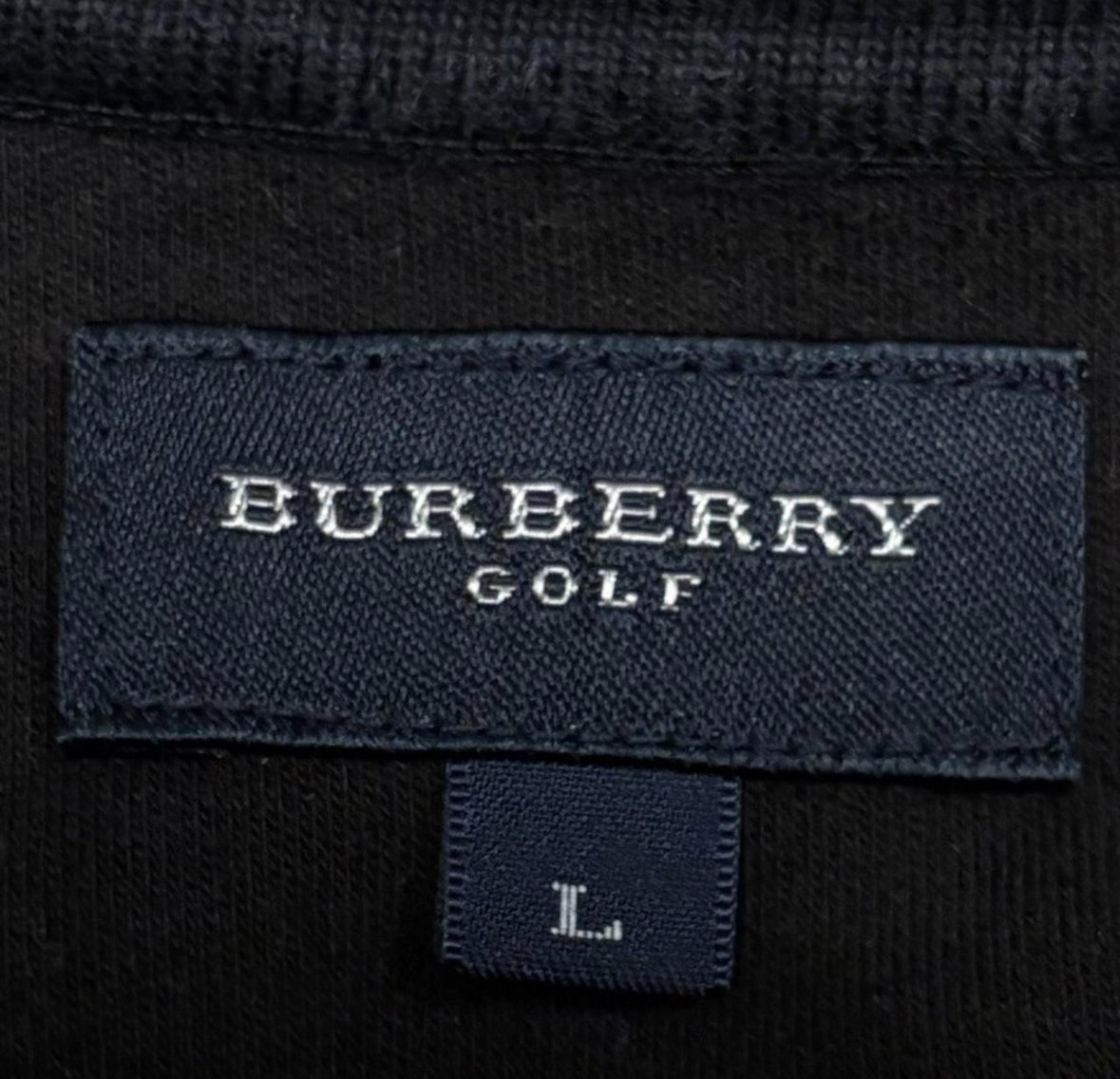 Burberry black polo longsleeve
T-shirt with pink detailing