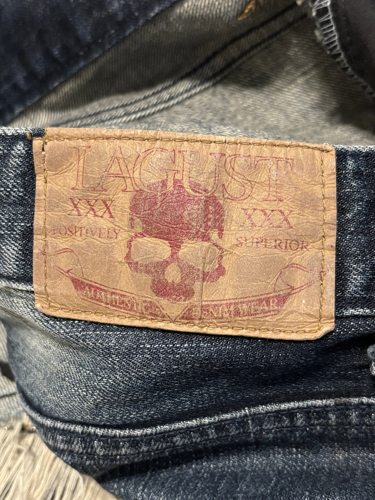 Lagust blue distressed painted bootcut jeans