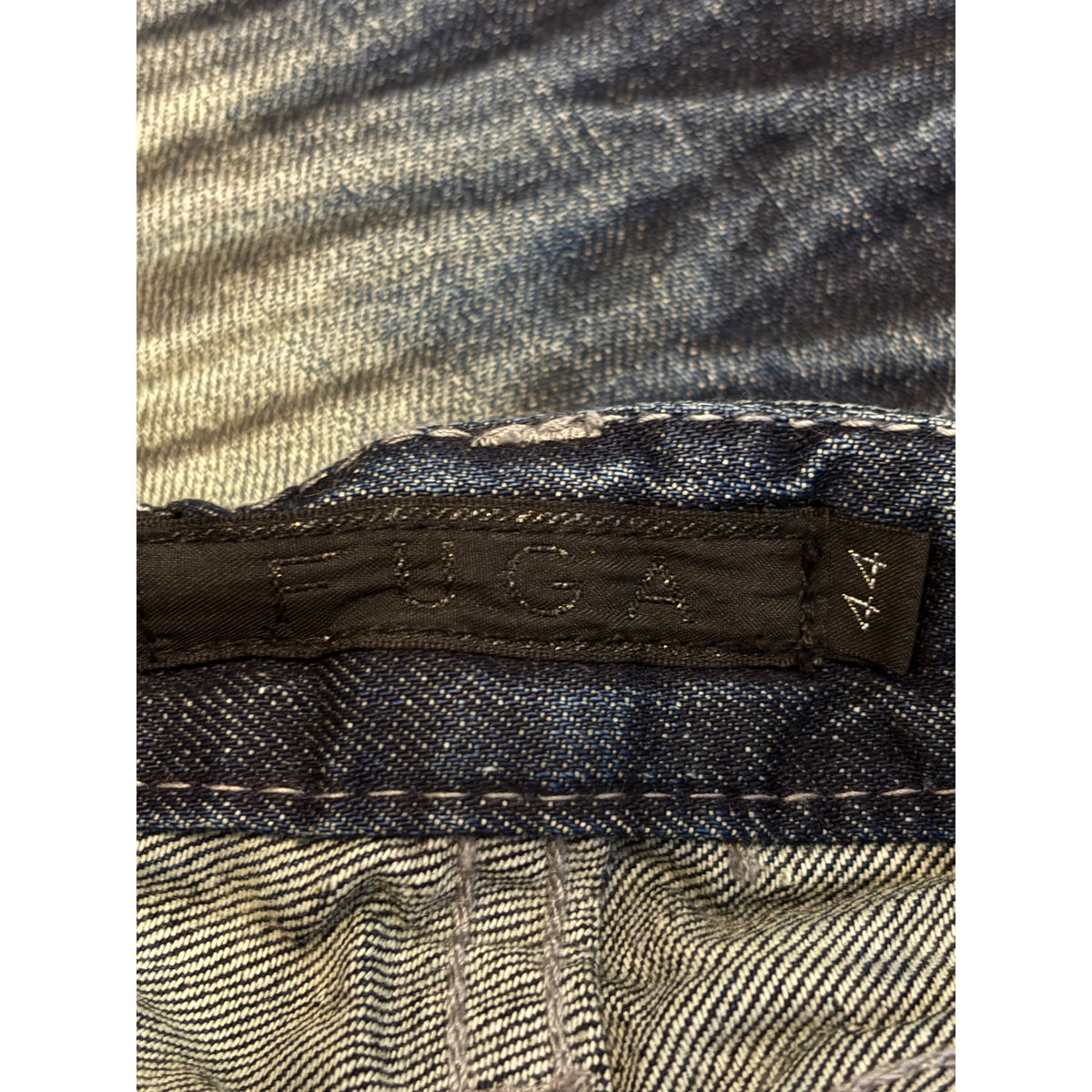 Fuga claw mark navy fade wash whiskered bootcut denim jeans