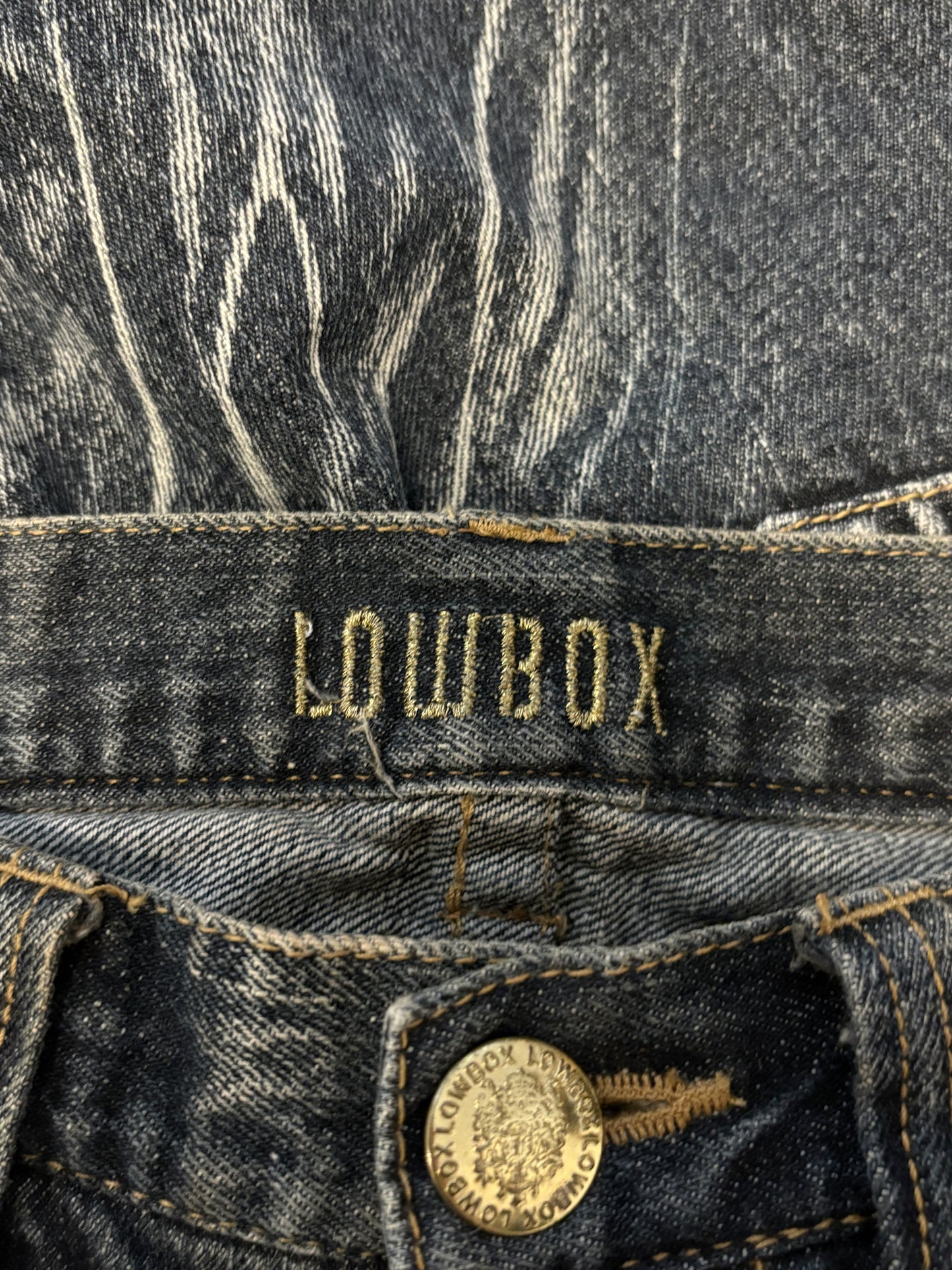 Lowbox streaked painted navy bootcut denim jeans