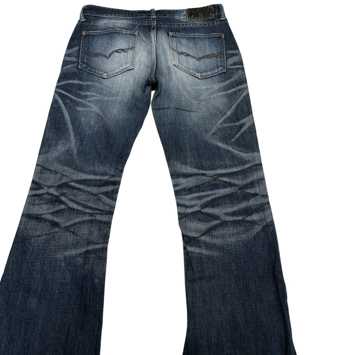 Fuga blue fade wash bootcut denim jeans w/ black claw mark streaking