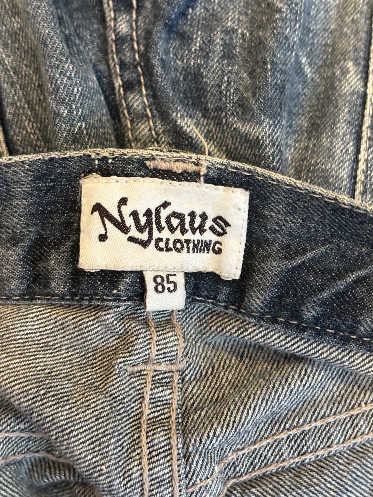 Nylaus distressed streaked wash denim jeans