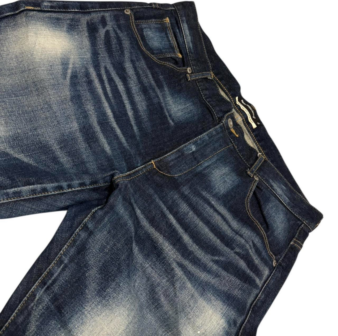 Semantic Design blue paint splatter denim jeans