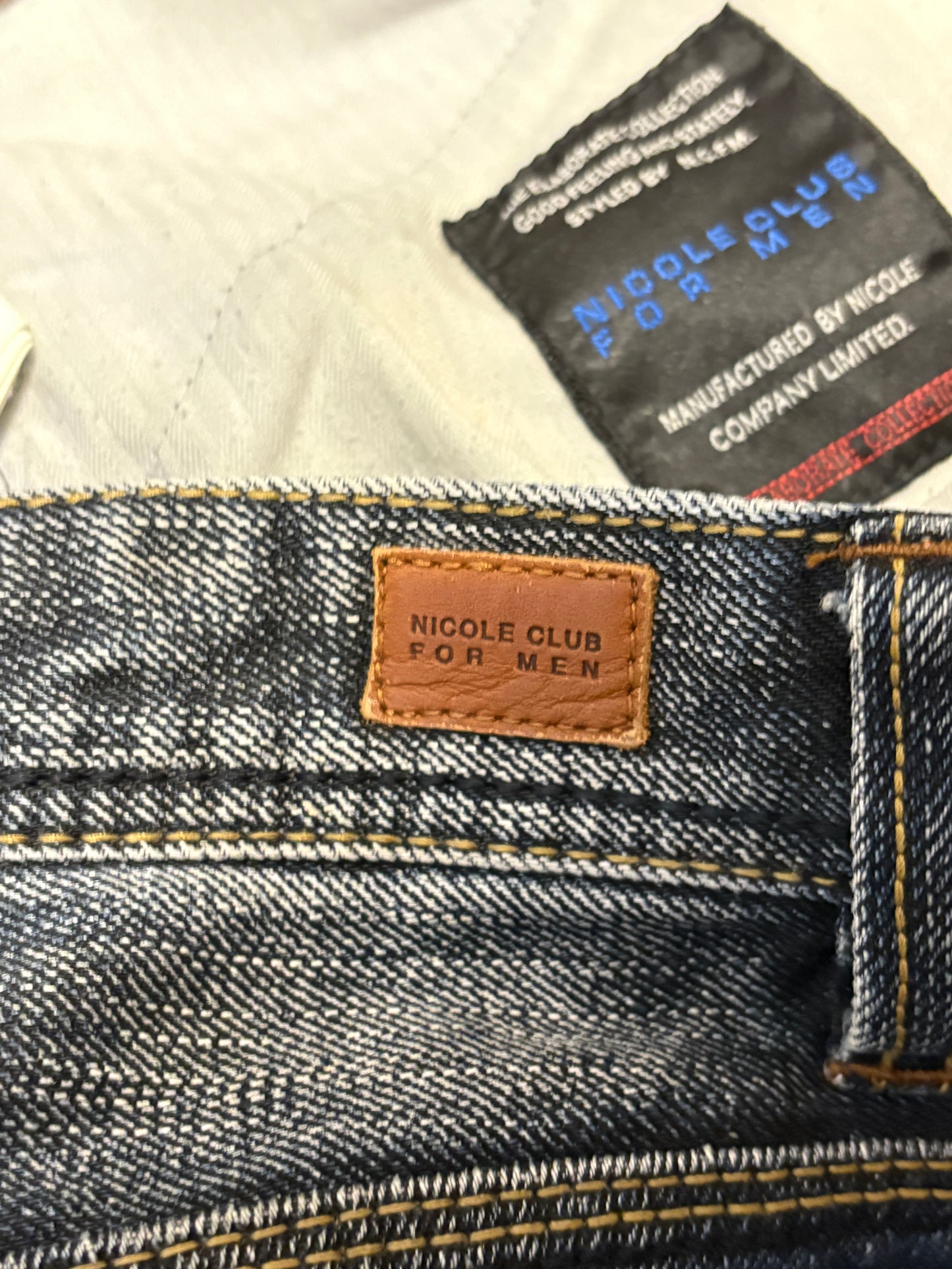Nicole Club distressed patchwork claw mark bootcut denim jeans