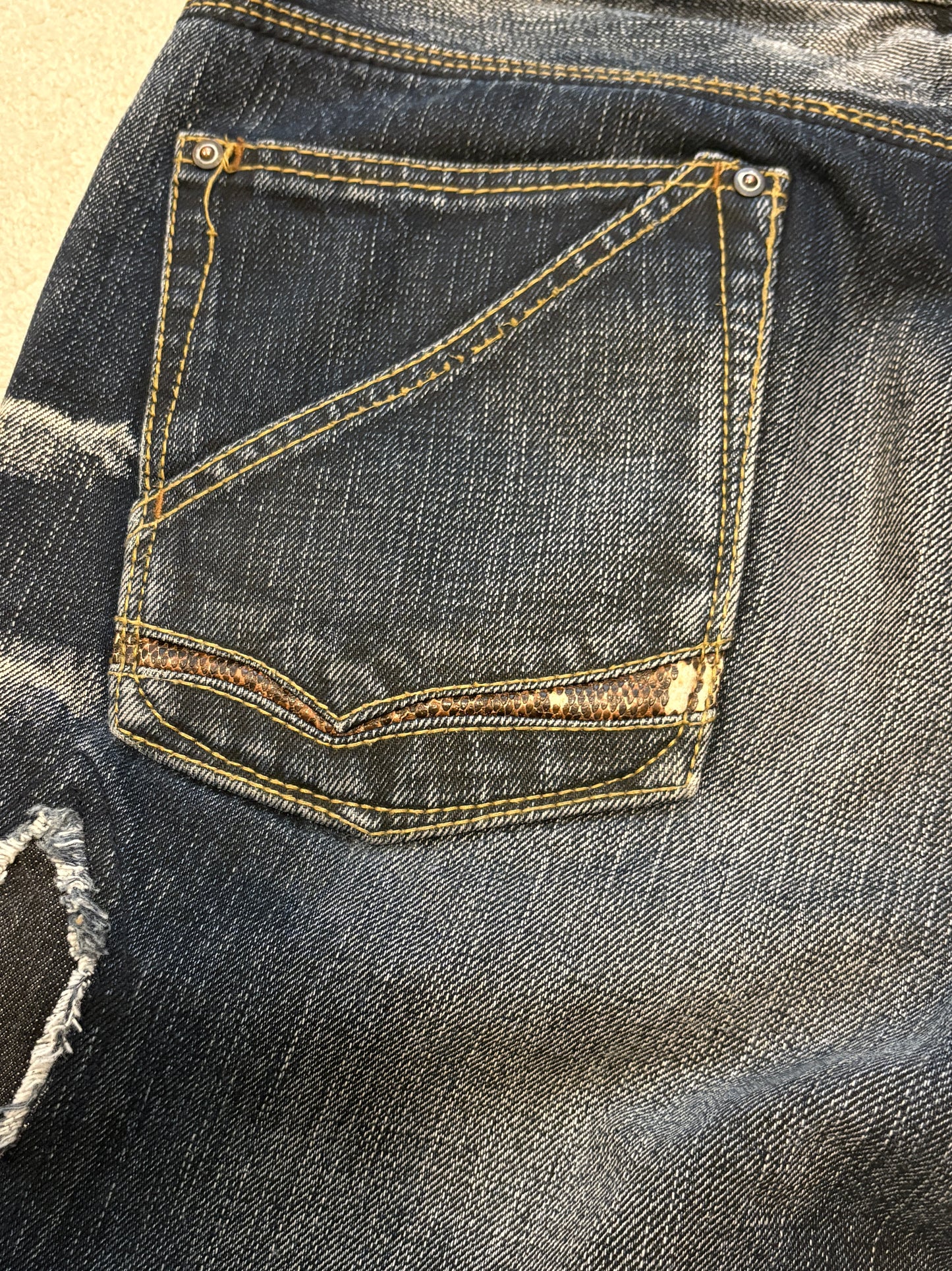 Nicole Club distressed patchwork claw mark bootcut denim jeans