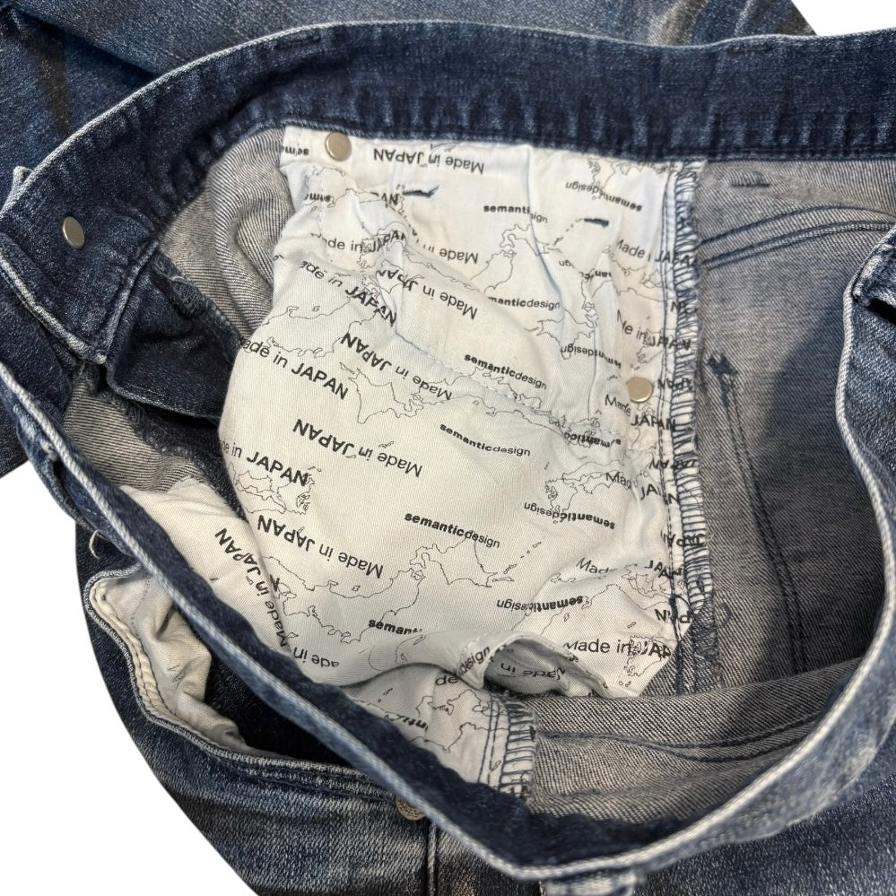 Semantic Design streaked claw mark wash denim jeans