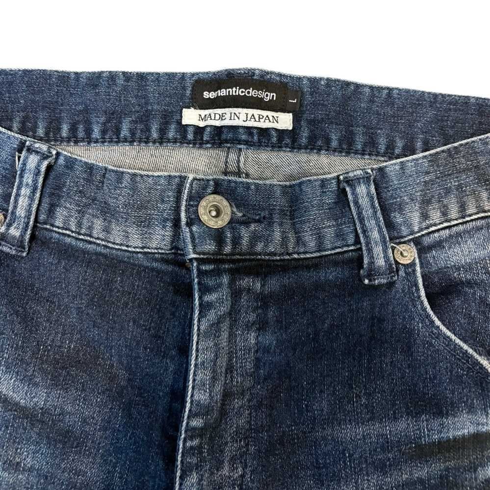 Semantic Design streaked claw mark wash denim jeans