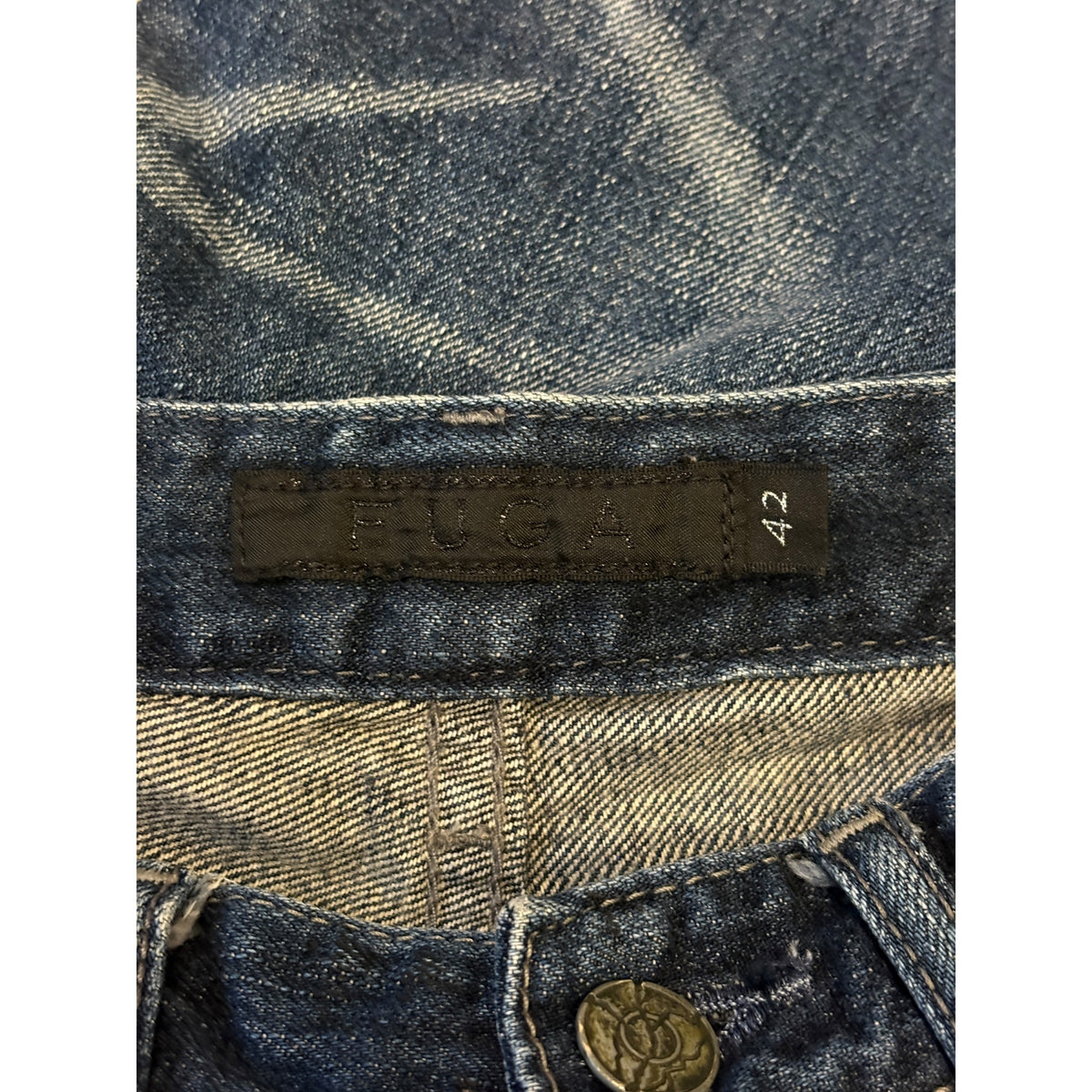 Fuga blue fade wash bootcut denim jeans w/ black claw mark streaking