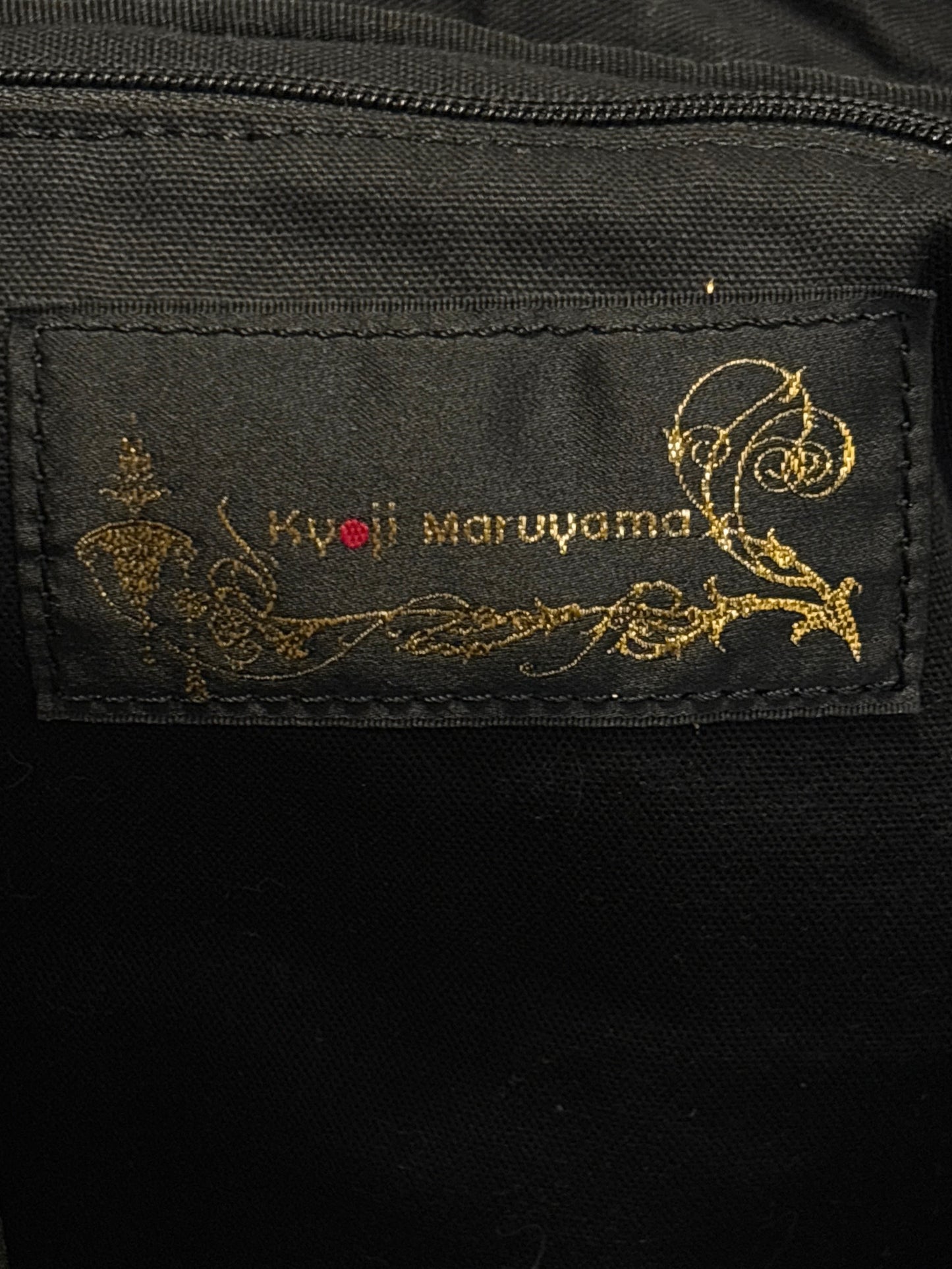 Kyoji Maruyama leather tassel detailed clutch carry bag